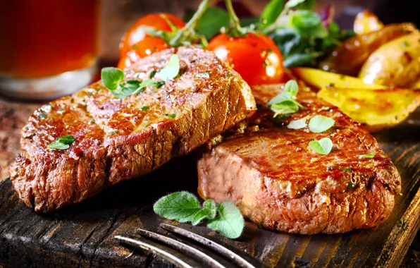 Greens, meat, tomatoes, steaks
