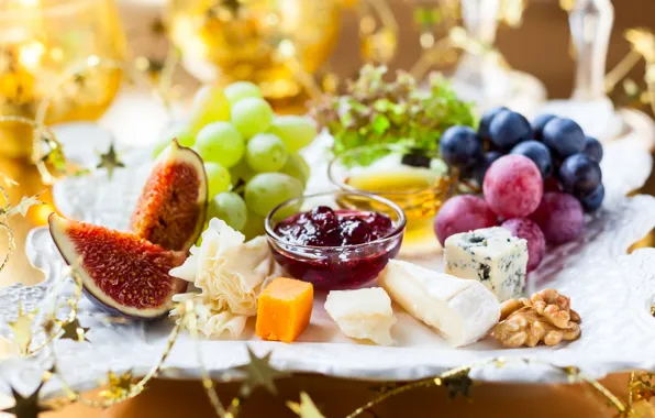 Cheese, walnut, grapes, jam, cuts, figs