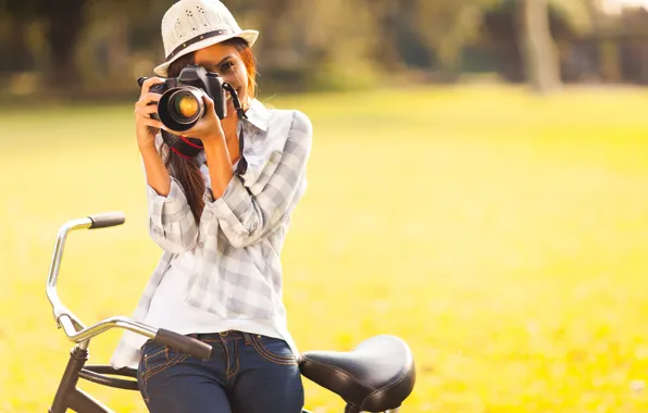 Picture greens, girl, bike, smile, hat, the camera, brown hair