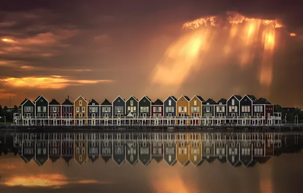 The sky, water, clouds, light, reflection, clouds, the city, houses