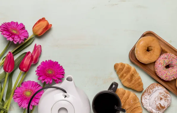 Flowers, tea, donuts, cakes