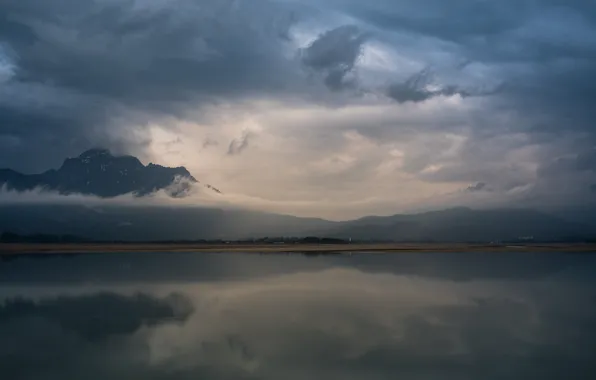 The sky, clouds, mountains, pond