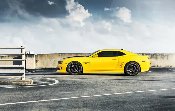 Picture yellow, black, the fence, profile, Chevrolet, drives, chevrolet, yellow