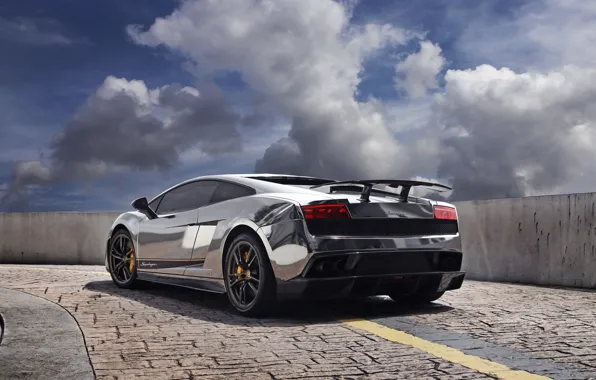 The sky, clouds, shadow, pavers, silver, the fence, gallardo, lamborghini