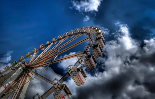 Picture the sky, wheel, carousel