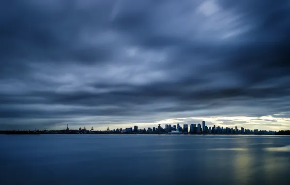 Storm, the city, the ocean, the evening, nebokray