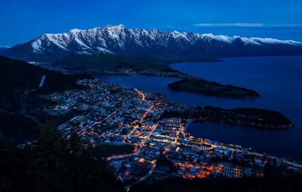 The sky, snow, mountains, night, the city, lights, blue, shore