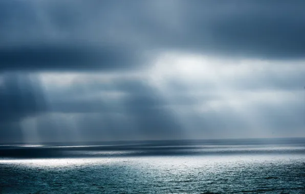 Sea, the sun, clouds, storm