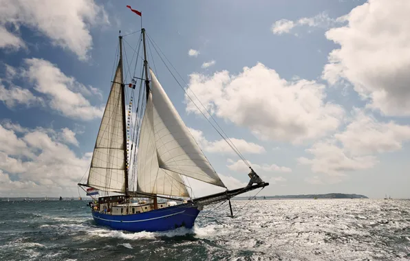 Sea, the sky, the sun, clouds, coast, yacht, sail