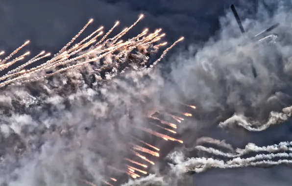 The sky, lights, smoke, helicopter
