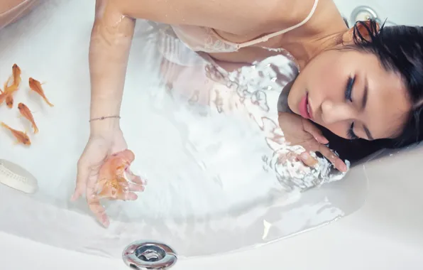 Picture girl, fish, bath