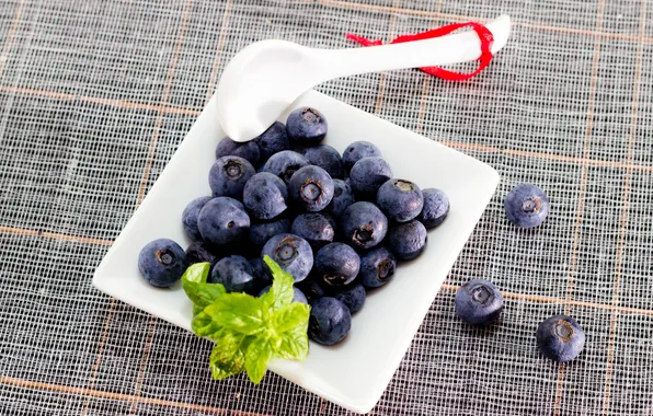 Picture berries, blueberries, spoon