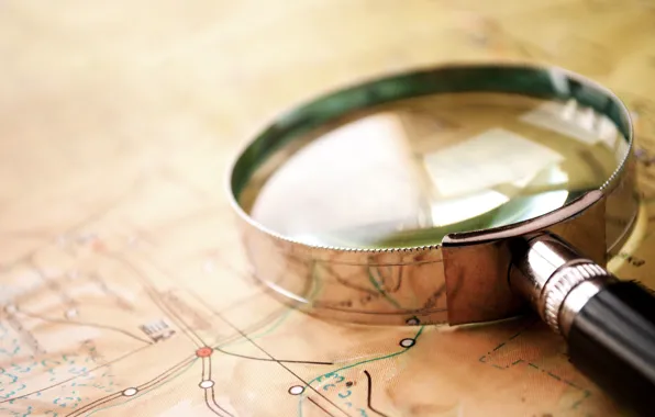 Glass, map, magnifying glass