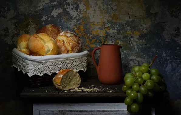 The dark background, table, grapes, pitcher, still life, buns