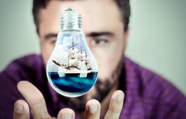 Picture light bulb, ship, hand