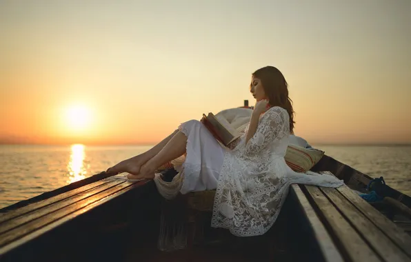 Picture girl, boat, book