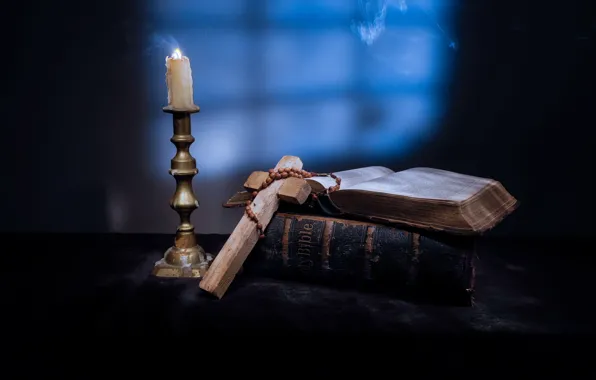 Candle, cross, book, the Bible