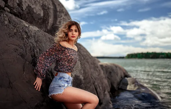 The sky, girl, clouds, landscape, stones, shore, model, shorts
