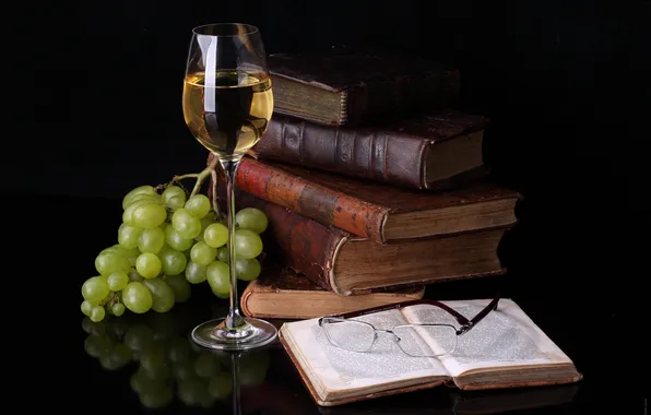 Wine, glasses, grapes, books, food for thought