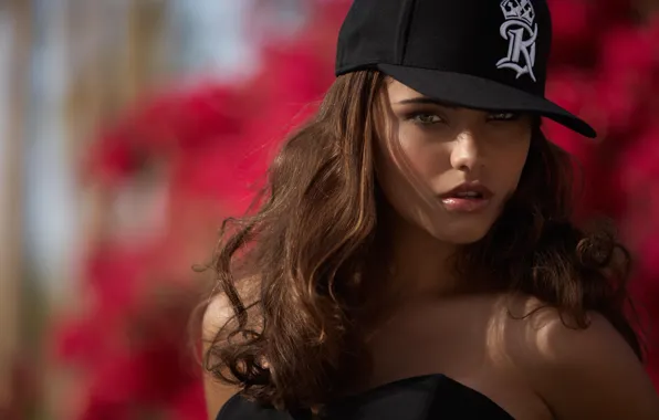 Model, pink background, baseball cap, Nataniele Ribiero