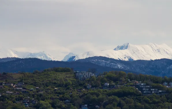 The sky, snow, trees, mountains, the city, rocks, building, home