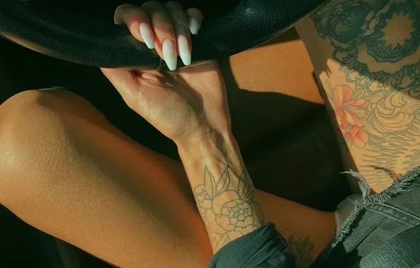 Girl, panties, tattoo, the wheel, manicure, denim skirt, slender legs, the tattoo on the arm