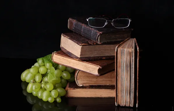 Picture reflection, table, books, glasses, grapes, food for thought
