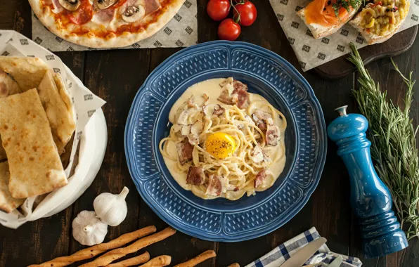 Greens, eggs, pizza, bacon, noodles, pita