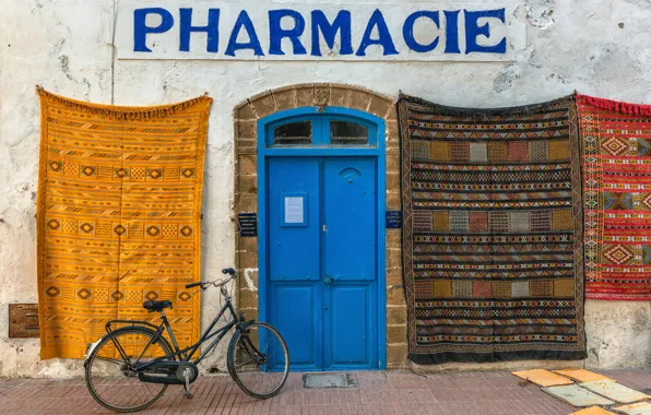 Picture bike, house, the door, sign, carpets