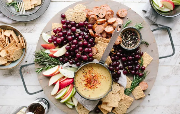 Berries, apples, pepper, fruit, crackers, sauce, sausage, rosemary