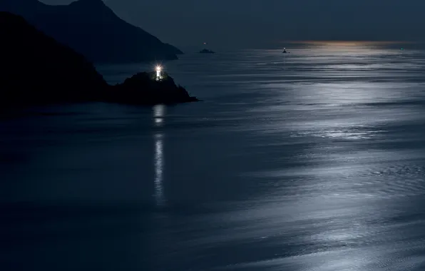 Sea, night, rocks, beacons