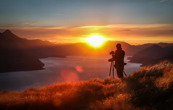 Picture the sun, clouds, sunset, mountains, lake, hill, photographer