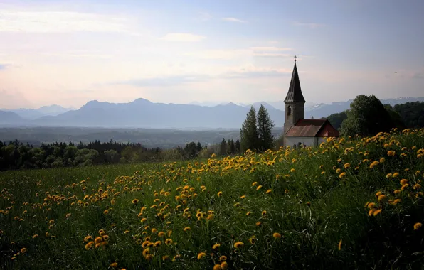 Mountains, dandelion, chapel