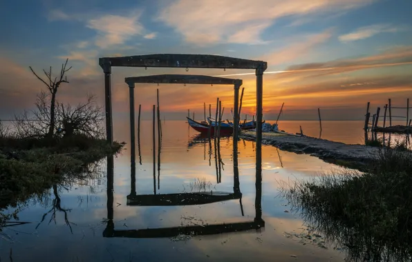 The sky, grass, clouds, sunset, branches, metal, lake, reflection