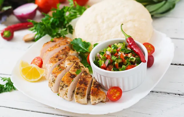 Picture pepper, tomatoes, salad, the second dish, Chicken breast, Pita