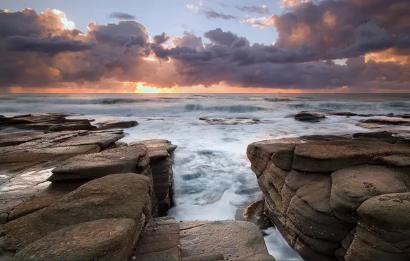 Picture water, the sun, clouds, sunset, fog, stones, the rays of the sun, Australia