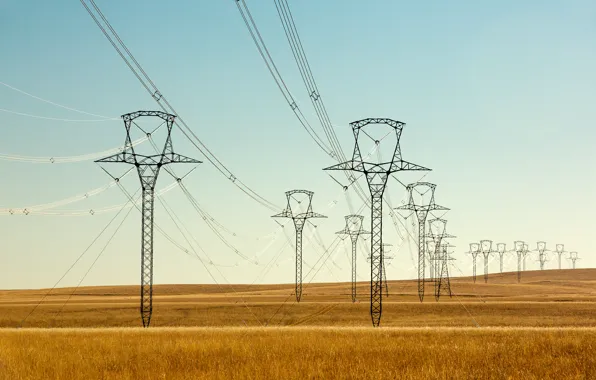 The sky, field, the countryside, solar, power lines, farm, the supports of high voltage lines