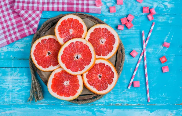 Candy, blue background, grapefruit