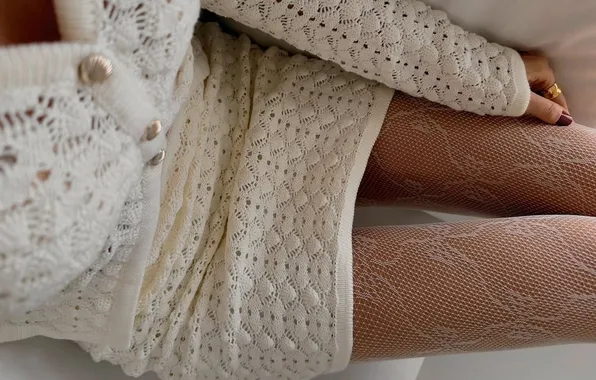 Dress, ring, manicure, fishnet tights, slender legs