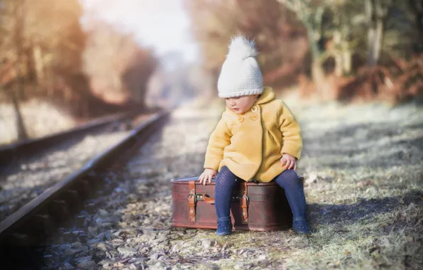Picture girl, railroad, suitcase