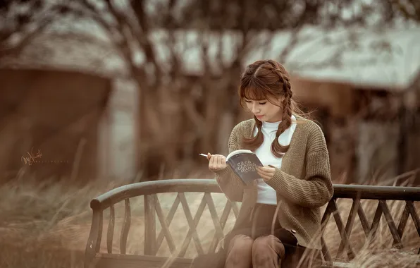 Picture girl, book, Asian, sitting, reads