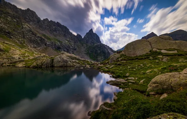 Clouds, mountains, lake, reflection, stones, shore, boulders