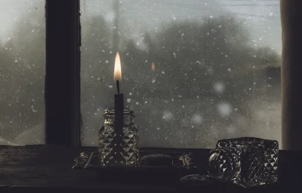 Picture the darkness, candle, window