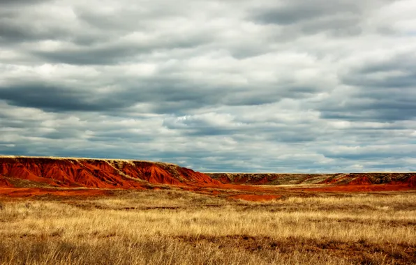 The sky, clouds, mountains, the steppe