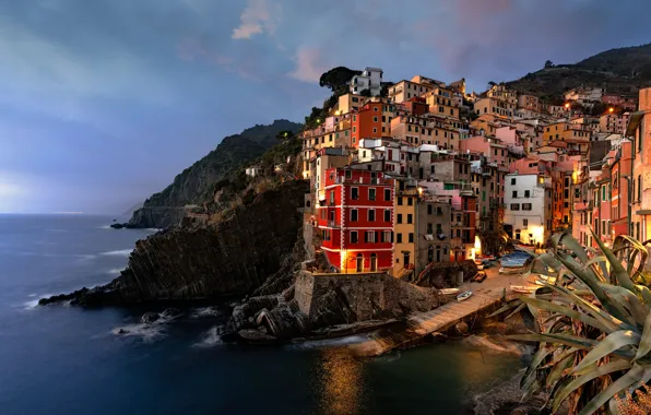 Sea, clouds, the city, lights, rocks, hills, shore, coast
