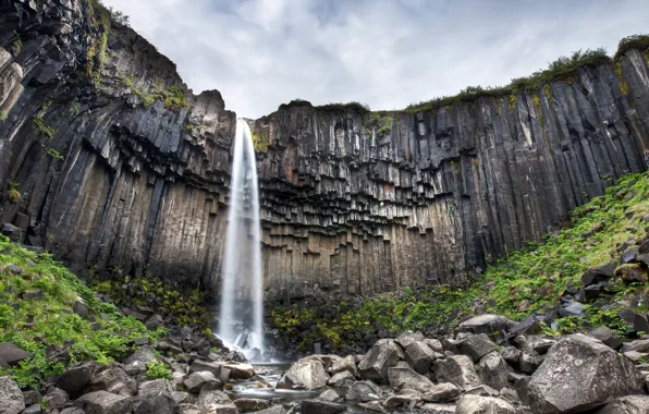 Picture Iceland, the ledge, black basalt columns, "Black waterfall", the svartifoss waterfall, resembling organ pipes, pointed …