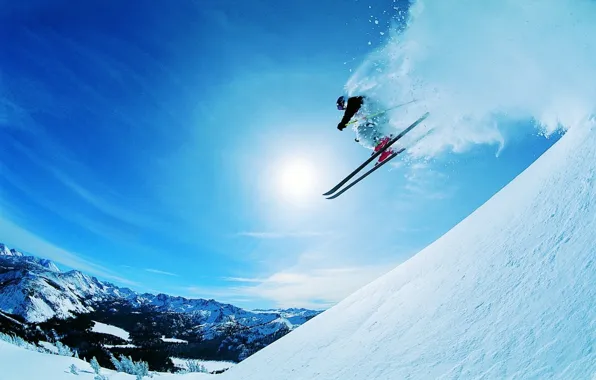 Picture the sun, snow, mountains, the descent, speed, slope, extreme, skier