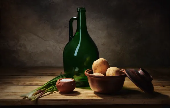 The dark background, table, bottle, food, bow, dishes, bowl, cover