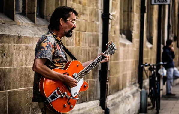 Picture street, people, guitar