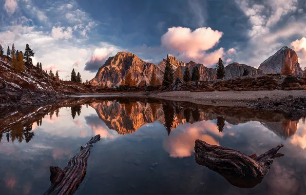 The sky, clouds, mountains, reflection.